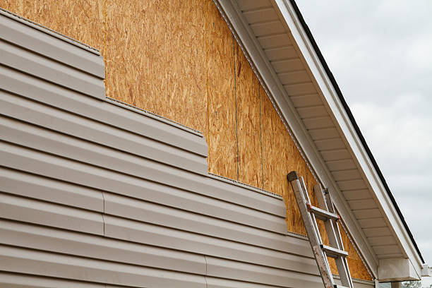 Professional Emergency Siding Repair technician working in Vale, OR
